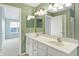 Well-lit bathroom featuring a double sink vanity with great views from the adjacent window at 17223 Gunther Blvd # 310, Westfield, IN 46074