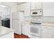 Efficient kitchen with white appliances at 17223 Gunther Blvd # 310, Westfield, IN 46074
