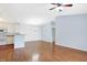 Open living space with hardwood floors and easy access to the kitchen area at 17223 Gunther Blvd # 310, Westfield, IN 46074