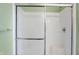 This updated glass-enclosed shower offers an easily accessible seat for additional comfort and convenience at 17223 Gunther Blvd # 310, Westfield, IN 46074