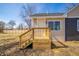 New back deck and entrance on a home with two-tone siding at 227 W 7Th St, Lapel, IN 46051