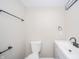Bathroom featuring a new toilet, modern faucet, sink and fixtures at 227 W 7Th St, Lapel, IN 46051