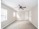 Bedroom featuring a ceiling fan, two new windows, and neutral colors at 227 W 7Th St, Lapel, IN 46051