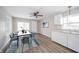 Modern dining room with a sleek table, stylish chairs, and bright natural light at 227 W 7Th St, Lapel, IN 46051