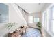 Stylish entryway with modern console table, decor, and staircase at 227 W 7Th St, Lapel, IN 46051
