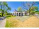 Attractive home with a manicured front yard and a combination of black and beige siding at 227 W 7Th St, Lapel, IN 46051
