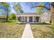 Charming home with a covered front porch and freshly manicured lawn, perfect for curb appeal at 227 W 7Th St, Lapel, IN 46051
