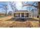 Charming home featuring a freshly painted exterior, inviting front porch and picturesque landscaping at 227 W 7Th St, Lapel, IN 46051