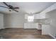 Kitchen with white cabinets, granite countertops, and hardwood floors at 227 W 7Th St, Lapel, IN 46051