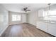 Kitchen with white cabinets, granite countertops, and hardwood floors at 227 W 7Th St, Lapel, IN 46051
