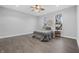 An expansive bedroom features neutral colored walls and wood floors at 235 E 11Th St, Indianapolis, IN 46202