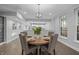 Well-appointed dining room adjacent to an open kitchen, perfect for entertaining at 235 E 11Th St, Indianapolis, IN 46202