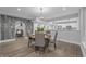 Dining room with stylish furnishings and an exposed brick archway at 235 E 11Th St, Indianapolis, IN 46202