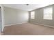 Neutral bedroom with natural light and plush carpeting at 2605 Carrollton Ave, Indianapolis, IN 46205