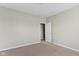 A neutral bedroom with beige carpet and walls at 2605 Carrollton Ave, Indianapolis, IN 46205