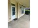 Inviting front porch with a 'hello' doormat and house number 2605 at 2605 Carrollton Ave, Indianapolis, IN 46205