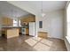 Functional kitchen featuring light wood cabinetry, white appliances, and tile flooring at 2605 Carrollton Ave, Indianapolis, IN 46205