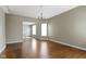 Living room featuring hardwood floors and an open floor plan at 2605 Carrollton Ave, Indianapolis, IN 46205