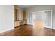 Inviting office space featuring built-in shelving and hardwood floors, perfect for working from home at 2605 Carrollton Ave, Indianapolis, IN 46205