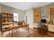 Cozy home office with custom built-ins, a comfortable rug, and a bright workspace at 2605 Carrollton Ave, Indianapolis, IN 46205