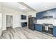 Well-equipped kitchen boasting stainless steel appliances, gray floors, and ample counter space at 2914 N Delaware N St, Indianapolis, IN 46205