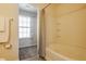 Bright bathroom with a bathtub and shower featuring natural light at 5303 Brandywine Dr, Whitestown, IN 46075