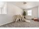 Bright bonus room with neutral walls, carpet, and a large window, play area at 5303 Brandywine Dr, Whitestown, IN 46075