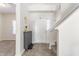 Bright foyer featuring clean lines, neutral colors, tiled floor and staircase leading upstairs at 5303 Brandywine Dr, Whitestown, IN 46075