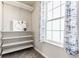 Walk-in closet featuring shelving and storage solutions with natural light at 5303 Brandywine Dr, Whitestown, IN 46075