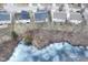 An aerial view of homes backing onto a lake covered with ice at 5815 Noble Dr, Indianapolis, IN 46234