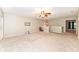 Bonus room featuring neutral paint, ceiling fan, and view to the entry way at 5815 Noble Dr, Indianapolis, IN 46234