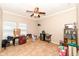 Spacious bonus room or potential office space with tile floors and natural lighting at 5815 Noble Dr, Indianapolis, IN 46234