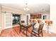 Eat-in dining area features a glass-top dining table and sliding barn doors at 5815 Noble Dr, Indianapolis, IN 46234