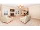 Bright and open living room with a cozy fireplace and neutral tones at 5815 Noble Dr, Indianapolis, IN 46234