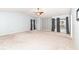 Large main bedroom with ceiling fan, neutral carpet, and lots of natural light at 5815 Noble Dr, Indianapolis, IN 46234