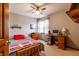 Bedroom featuring neutral walls and desk perfect for study or hobby at 6006 Regency Dr, Columbus, IN 47203
