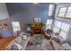 High angle view of a living room boasting a fireplace, windows, and comfortable seating at 6006 Regency Dr, Columbus, IN 47203
