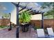 Outdoor patio area with outdoor furniture under a pergola, perfect for entertaining at 6006 Regency Dr, Columbus, IN 47203