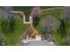 A waterfront home with mature trees, backyard deck, and private dock create an inviting outdoor living space at 6045 Channel Dr, Columbus, IN 47201