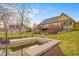 An inviting backyard featuring a unique water feature, ideal for relaxation and outdoor enjoyment at 6045 Channel Dr, Columbus, IN 47201
