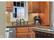 Kitchen featuring granite counters, stainless steel appliances, and modern fixtures at 6045 Channel Dr, Columbus, IN 47201