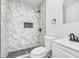 Modern bathroom with tiled walk-in shower, contemporary fixtures, and vanity at 650 S Lyons Ave, Indianapolis, IN 46241
