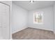 Bright bedroom features neutral tones and plush carpeting, offering a serene and comfortable space at 650 S Lyons Ave, Indianapolis, IN 46241