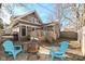 Inviting backyard with a wooden deck, patio area, a fire pit, and cozy outdoor seating at 764 E 42Nd St, Indianapolis, IN 46205