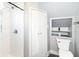 Cozy bathroom with white subway tile shower and a built-in display shelf near the toilet at 764 E 42Nd St, Indianapolis, IN 46205