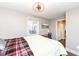 Cozy bedroom features a work space and a closet at 764 E 42Nd St, Indianapolis, IN 46205