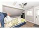 Charming bedroom with sloped ceilings, carpet, and an exterior entrance at 764 E 42Nd St, Indianapolis, IN 46205