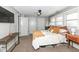 Bedroom featuring neutral walls, carpet, and doors leading to closets and other spaces at 764 E 42Nd St, Indianapolis, IN 46205