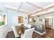 Elegant dining room with a coffered ceiling, seating for six, and seamless access to the kitchen at 764 E 42Nd St, Indianapolis, IN 46205