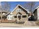 Charming two-story home with a covered front porch and a private driveway, nestled in a quiet neighborhood at 764 E 42Nd St, Indianapolis, IN 46205